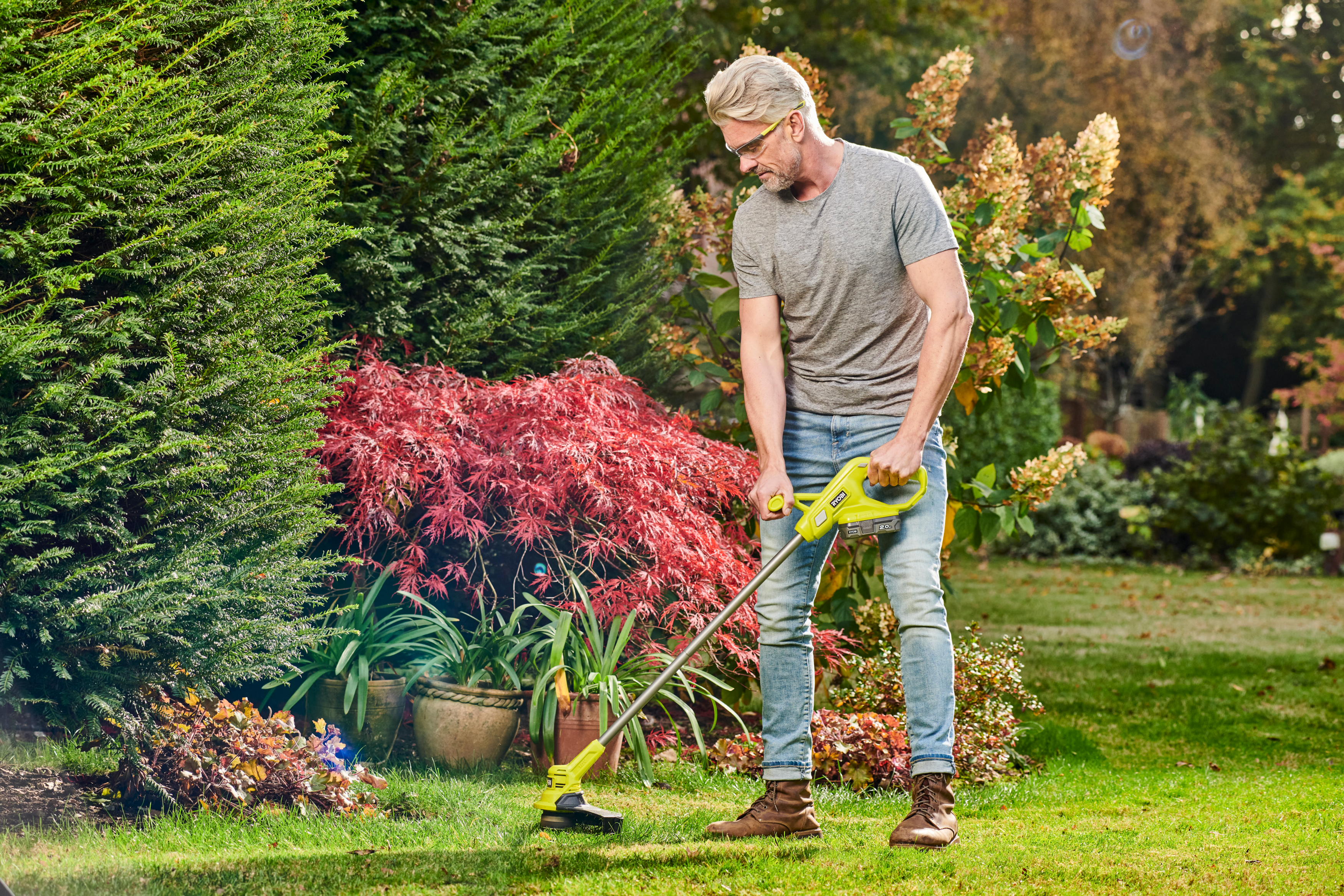 Ryobi Akku-Rasentrimmer RY18LT23A-120  Ryobi Akku-Rasentrimmer RY18LT23A-120